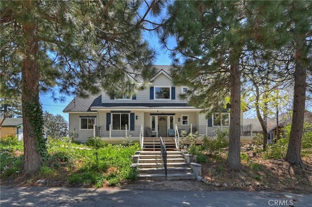 27513 St Bernard Ln, Lake Arrowhead, CA 92352 - view of front of home with stairs and a porch