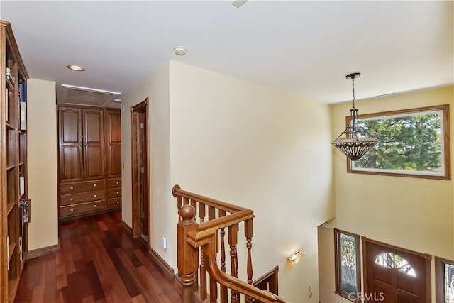 27513 St Bernard Ln, Lake Arrowhead, CA 92352 - hall with an upstairs landing, attic access, dark wood finished floors, and recessed lighting