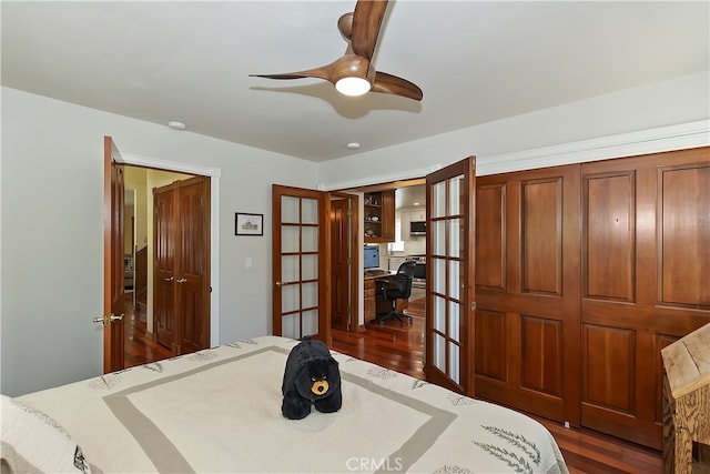 27513 St Bernard Ln, Lake Arrowhead, CA 92352 - bedroom with french doors, wood finished floors, a desk, and ceiling fan