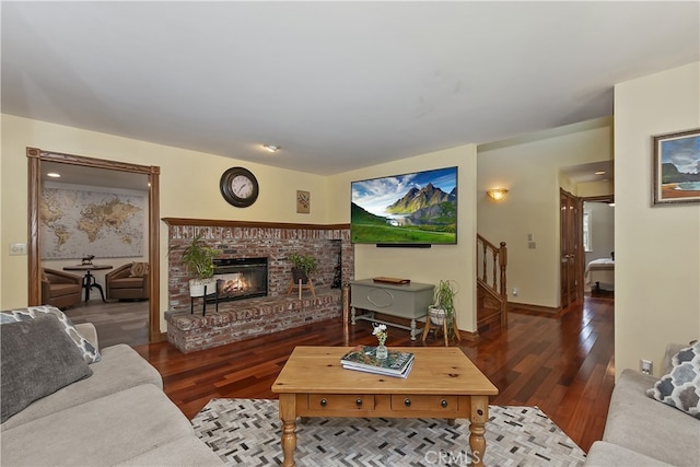 27513 St Bernard Ln, Lake Arrowhead, CA 92352 - living area with a fireplace, wood finished floors, stairway, and baseboards