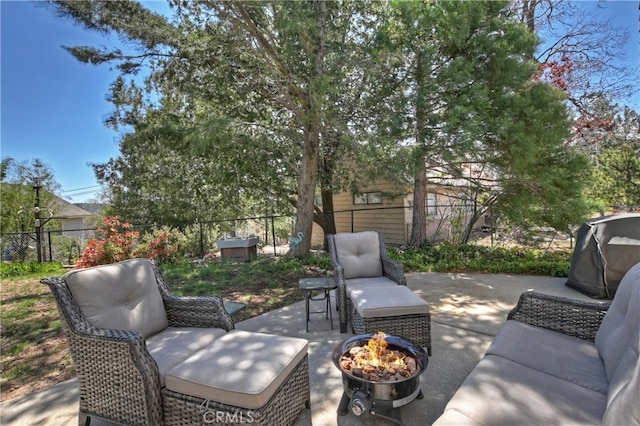 27513 St Bernard Ln, Lake Arrowhead, CA 92352 - view of patio / terrace with an outdoor fire pit