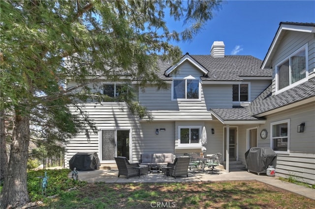 27513 St Bernard Ln, Lake Arrowhead, CA 92352 - rear view of property featuring an outdoor hangout area, a chimney, a patio, and entry steps