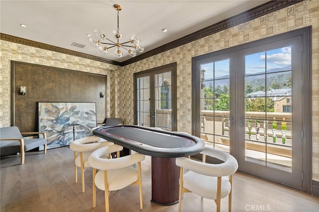 18 Dovetail Ln, Bradbury, CA 91008 - rec room featuring french doors, a chandelier, light wood-type flooring, ornamental molding, and wallpapered walls