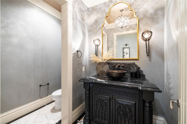 18 Dovetail Ln, Bradbury, CA 91008 - bathroom with baseboards, toilet, vanity, and marble look tile flooring