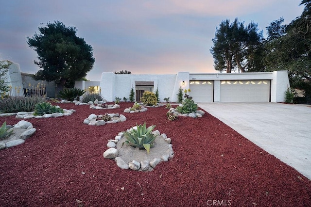 2610 King Way, Claremont, CA 91711 - view of front of home featuring a garage, driveway, and stucco siding