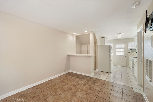 2707 S El Camino Real, San Clemente, CA 92672 - empty room featuring recessed lighting, baseboards, and a smoke detector