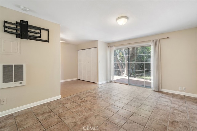 2707 S El Camino Real, San Clemente, CA 92672 - spare room featuring a smoke detector and baseboards