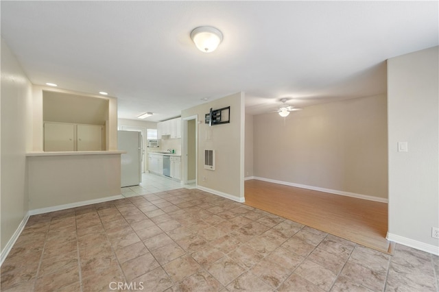 2707 S El Camino Real, San Clemente, CA 92672 - unfurnished living room with ceiling fan, baseboards, and recessed lighting