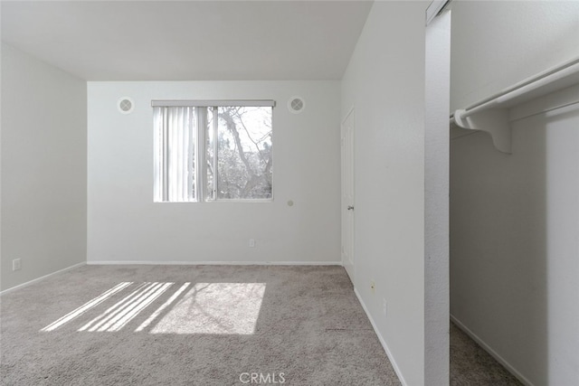 2807 W W Ave K12, Unit 256, Lancaster, CA 93536 - unfurnished bedroom featuring carpet floors and baseboards