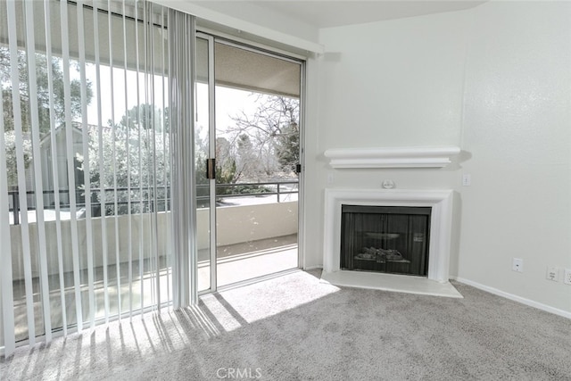 2807 W W Ave K12, Unit 256, Lancaster, CA 93536 - unfurnished living room with a fireplace with flush hearth, carpet floors, and baseboards