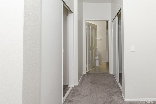2807 W W Ave K12, Unit 256, Lancaster, CA 93536 - hall featuring carpet flooring and baseboards