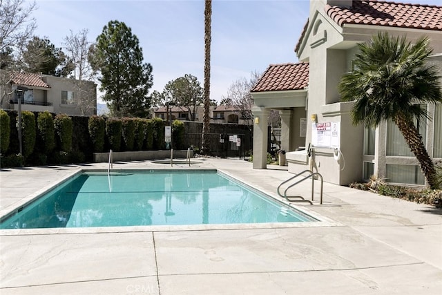 2807 W W Ave K12, Unit 256, Lancaster, CA 93536 - community pool with a patio and fence
