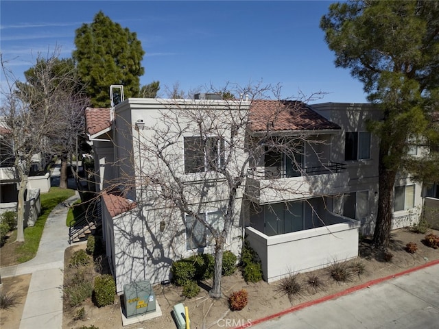 2807 W W Ave K12, Unit 256, Lancaster, CA 93536 - view of side of property with a balcony