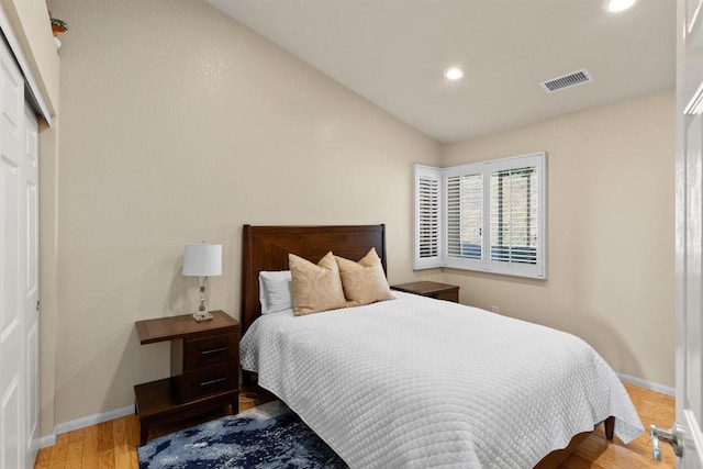 13311 Hillstar Ln, Valley Center, CA 92082 - bedroom with vaulted ceiling, baseboards, recessed lighting, and wood finished floors