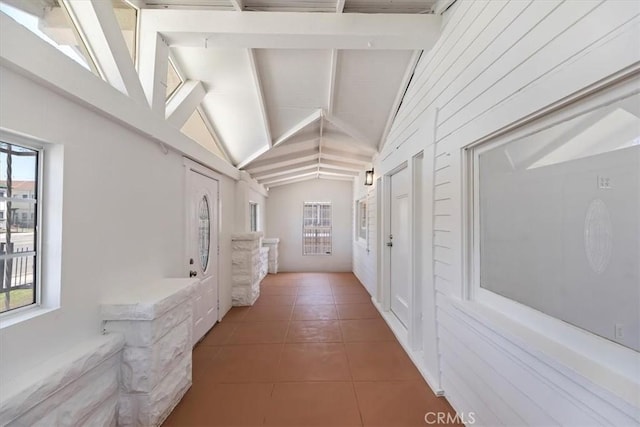 hallway with light tile patterned floors