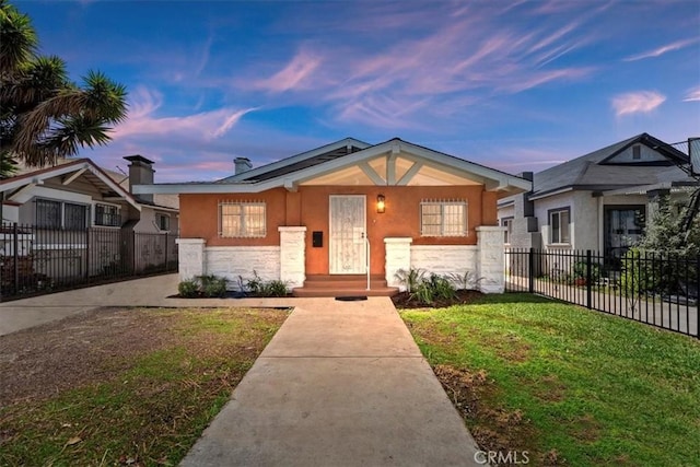 view of front of home featuring stucco siding