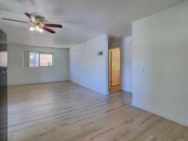 540 65th St Unit 203, San Diego, CA 92114 - spare room with a ceiling fan, light wood-type flooring, and baseboards