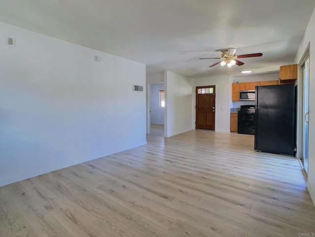 540 65th St Unit 203, San Diego, CA 92114 - unfurnished living room with ceiling fan, light wood finished floors, and baseboards