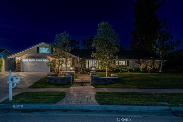 1448 W Domingo Rd, Fullerton, CA 92833 - view of front facade featuring driveway, a lawn, and an attached garage