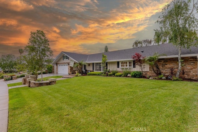 1448 W Domingo Rd, Fullerton, CA 92833 - single story home with a front lawn, driveway, a garage, and stone siding