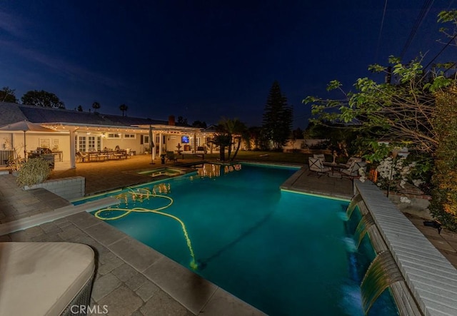 1448 W Domingo Rd, Fullerton, CA 92833 - pool at twilight featuring an outdoor pool and a patio area