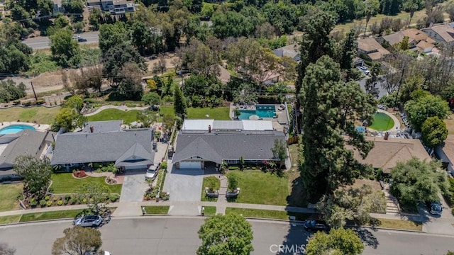 1448 W Domingo Rd, Fullerton, CA 92833 - aerial overview of property's location featuring a pool area and nearby suburban area
