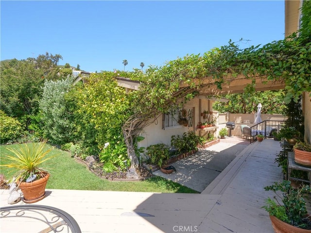 30915 Oceangrove Dr, Rancho Palos Verdes, CA 90275 - view of side of home with stucco siding, a patio area, and a wooden deck
