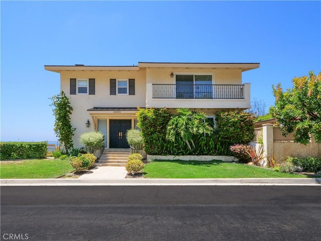 30915 Oceangrove Dr, Rancho Palos Verdes, CA 90275 - view of front of property featuring stucco siding, a front lawn, and a balcony