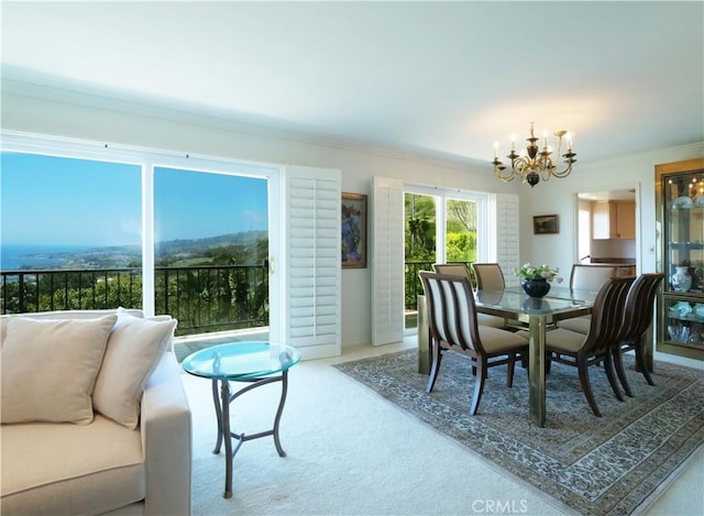 30915 Oceangrove Dr, Rancho Palos Verdes, CA 90275 - carpeted dining room featuring a chandelier and ornamental molding