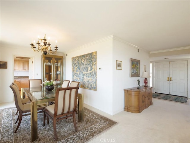 30915 Oceangrove Dr, Rancho Palos Verdes, CA 90275 - dining area featuring a chandelier, ornamental molding, light carpet, and baseboards