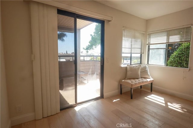 6670 Cozy Wood Ct, Whittier, CA 90601 - doorway with wood finished floors and baseboards