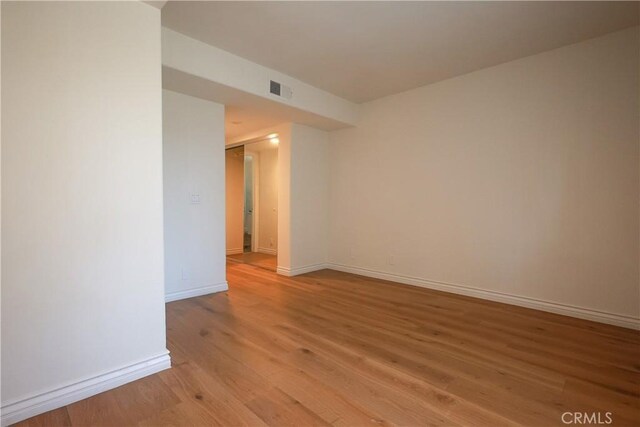 6670 Cozy Wood Ct, Whittier, CA 90601 - empty room featuring light wood finished floors and baseboards