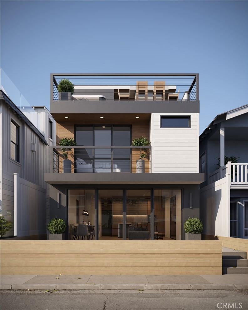 128 39th St, Newport Beach, CA 92663 - back of property with a balcony