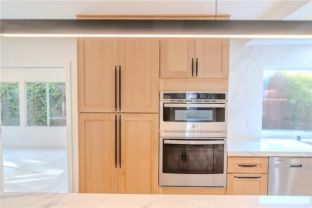 24701 Sarah Ln, Lake Forest, CA 92630 - kitchen with appliances with stainless steel finishes, light brown cabinetry, and light countertops