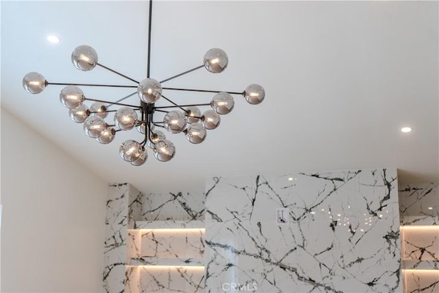 detailed view of recessed lighting and a chandelier