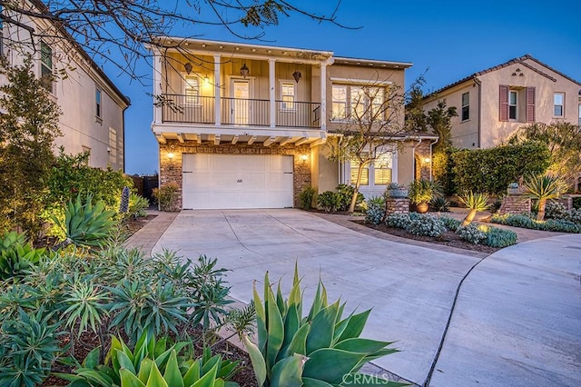 47 Cielo Azul, Mission Viejo, CA 92692 - view of front property with a balcony, driveway, and an attached garage