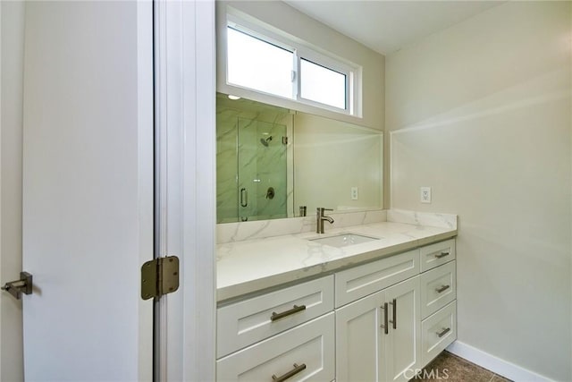 17721 Alexander Pl, Cerritos, CA 90703 - full bath featuring a marble finish shower, vanity, and baseboards