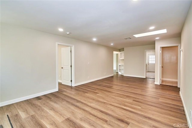 17721 Alexander Pl, Cerritos, CA 90703 - spare room featuring recessed lighting, light wood-type flooring, and baseboards
