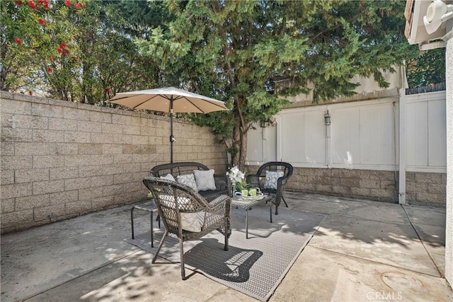 2 Chestnut Dr, Aliso Viejo, CA 92656 - fenced backyard with an outdoor hangout area and a patio