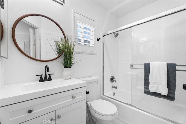2 Chestnut Dr, Aliso Viejo, CA 92656 - bathroom featuring toilet, vanity, and shower / bath combination with glass door