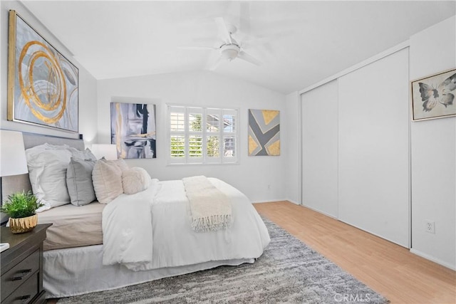2 Chestnut Dr, Aliso Viejo, CA 92656 - bedroom with wood finished floors, vaulted ceiling, a closet, and ceiling fan