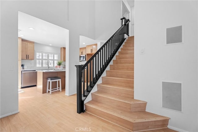 2 Chestnut Dr, Aliso Viejo, CA 92656 - staircase with wood finished floors, baseboards, and recessed lighting