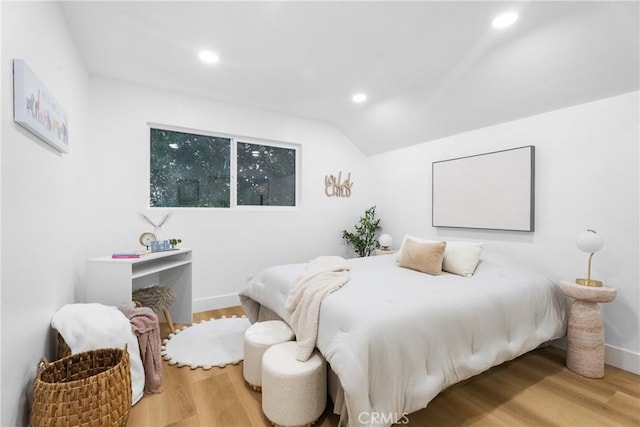 109 Loyola, Seal Beach, CA 90740 - bedroom with wood finished floors, recessed lighting, vaulted ceiling, and baseboards