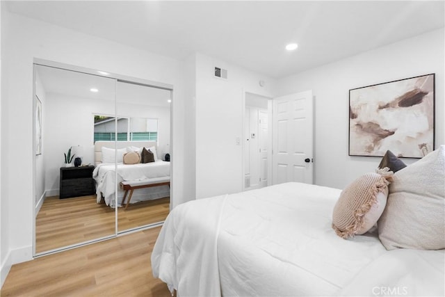 109 Loyola, Seal Beach, CA 90740 - bedroom with light wood finished floors, a closet, recessed lighting, and baseboards
