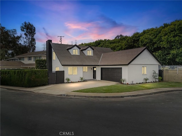 109 Loyola, Seal Beach, CA 90740 - view of front facade featuring concrete driveway, a gate, an attached garage, a chimney, and stucco siding
