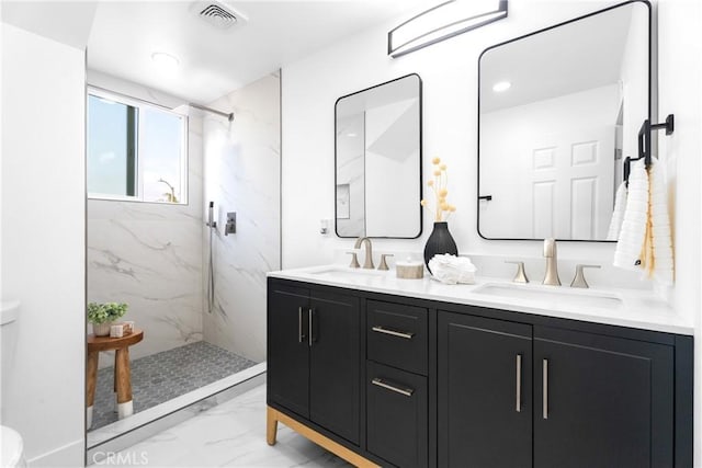 109 Loyola, Seal Beach, CA 90740 - full bath featuring marble look tile flooring, toilet, a marble finish shower, and double vanity
