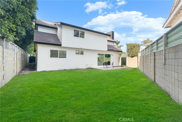 109 Loyola, Seal Beach, CA 90740 - rear view of house featuring a shingled roof, stucco siding, and a patio area