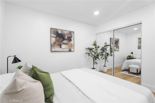 109 Loyola, Seal Beach, CA 90740 - bedroom with wood finished floors, recessed lighting, a closet, and baseboards