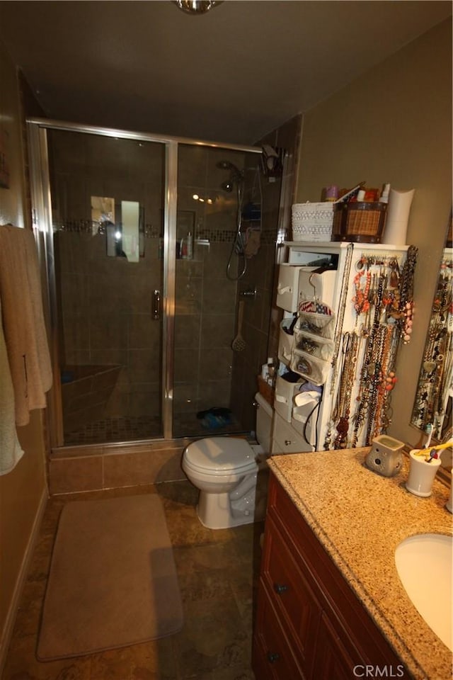 2026 Mirasol, North Tustin, CA 92705 - full bath with a shower stall, vanity, toilet, and tile patterned flooring