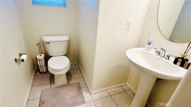 2652 W Madison Cir, Anaheim, CA 92801 - half bathroom with tile patterned flooring, toilet, and baseboards